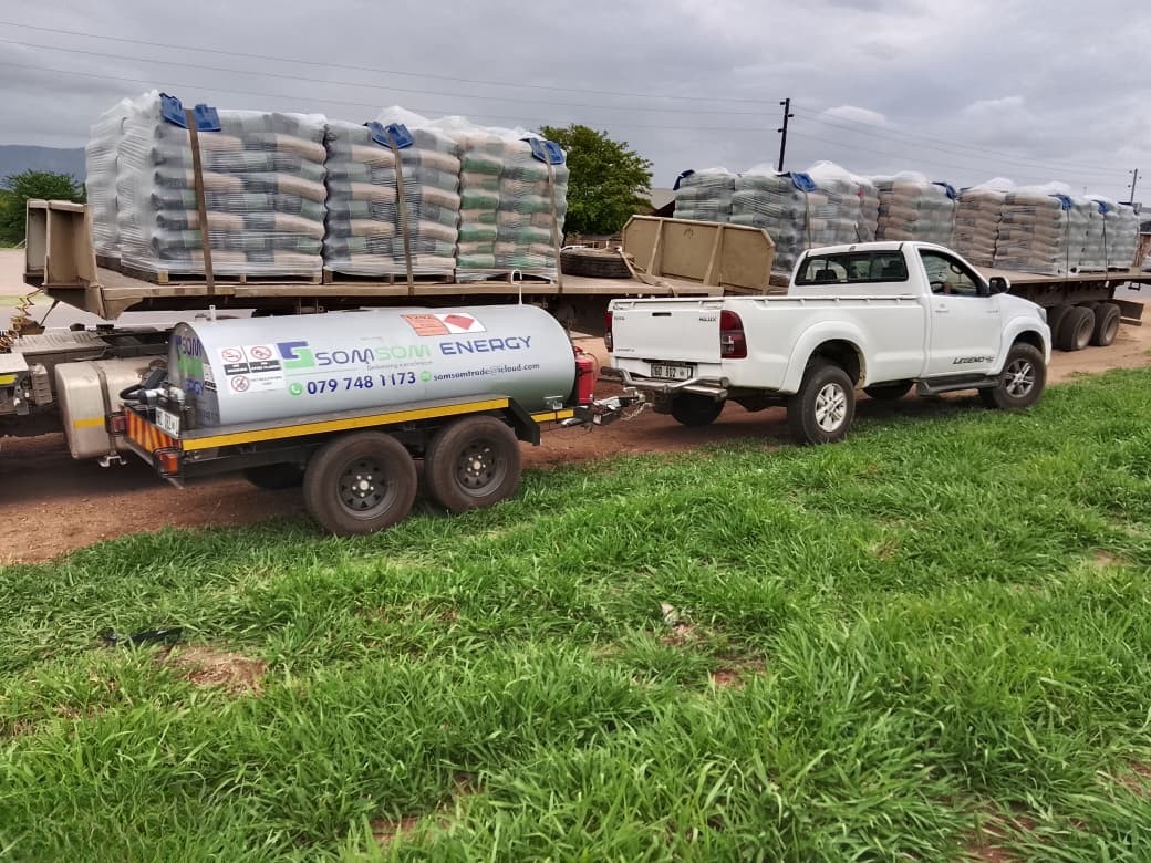 SOM SOM TRADING truck loaded with cement bags